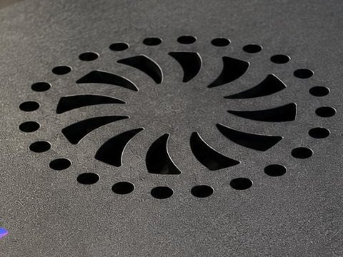 Close-up of the fan grille cut into Ody's metal lid